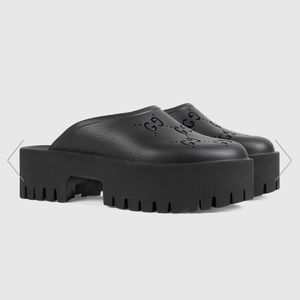 Gucci Women’s perforated platform, G sandal